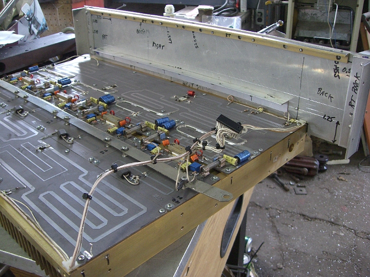 CIMG1482.JPG - The squiggly traces are transmission lines for the combiners and splitters.  The metal strip going down the middle is the silver plated copper +50V buss.