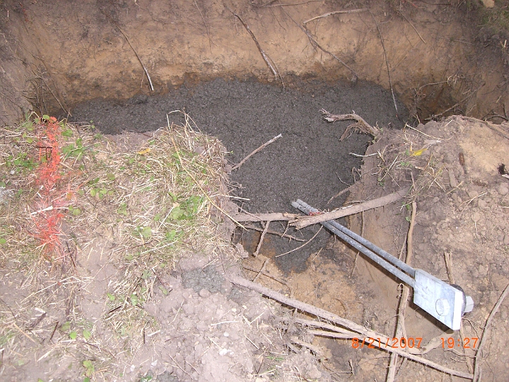 CIMG0112.JPG - I made my own anchors but was concerned about their strength.  I bought three from AN Wireless and then put mine in also.